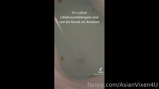 Heres me in the bathtub using a huge dildo.mp4