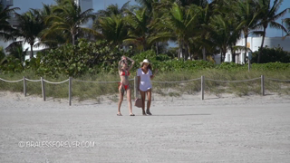 Red Bikinis on the Beach [1080p].mp4