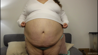 776511043_red-stretchmarks-indented-line-around-my-stomach-back-hurt_0.m4v