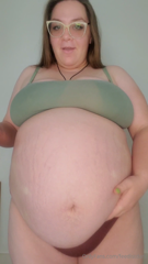 745568416_full-term-pregnant-belly-belly-shaking-belly-button-fin_0.m4v