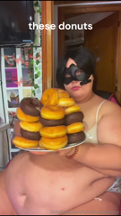 1151209890_eating-a-pile-of-donuts_0.mp4