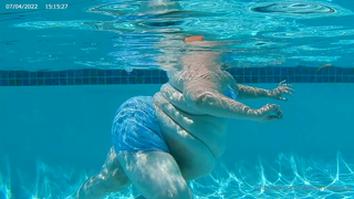 355314289_bathing-beauty-underwater-camera-of-amatrix-swimming-in-a-po_0.m4v