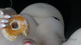 1248973351_overhead-stuffing-a-dozen-donuts-one-big-belly-i-ve-been_0.mp4