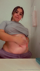 1241699466_rubbing-my-full-belly-with-cream_0.mp4