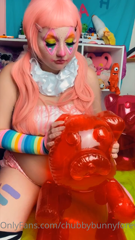 71652594_chubby-clown-sitting-on-and-riding-an-inflatable-gummy-bear_0.m4v
