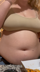 1496233873_having-some-fun-eating-and-playing-around-with-maternity-jea_0.mp4