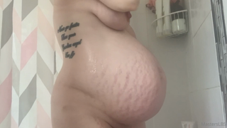 426586747_cum-watch-me-shower-and-lather-my-bump-up-in-this-extra-long_0.m4v