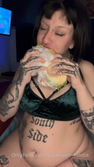 703122649_one-of-my-favorite-things-to-do-is-eat-until-my-belly-is-ful_1.mp4