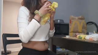 143683431_eating-mcdonald-s-two-burgers-fries-and-nuggets_0.m4v