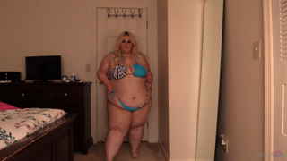 596010646_another-bikini-strip-tease_0.mp4