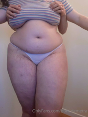 141600176_trying-on-an-old-t-shirt-with-the-help-of-my-feeder_0.m4v